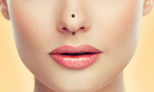 vertical tip nose piercings